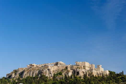 Ancient Acropolis during daytime. Athens Greece. Lot of copyspace.