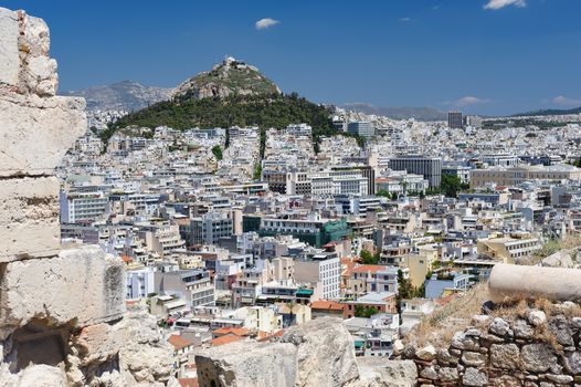 Athens Greece - April 27, 2016: Famous view from Acropolis to modern city with Lycabettus hill at background