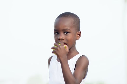 child eats an apple as it is nutritious.
