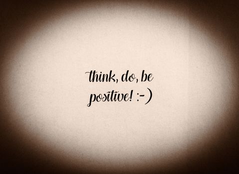 Be positive phrase written in black and white - sephia effect