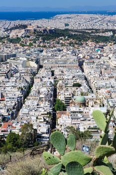 Athens Greece - April 27, 2016: Famous view from Lycabettus hill to modern city with Acropolis ans sea at background