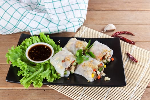 Noodle tube is appetizer menu Asia. made from noodle stuffed with pork and vegetables cooking by steamed.