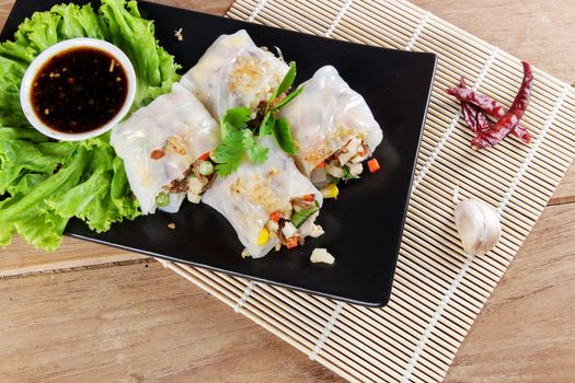 Noodle tube is appetizer menu Asia. made from noodle stuffed with pork and vegetables cooking by steamed.