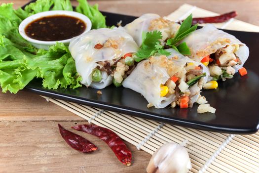 Noodle tube is appetizer menu Asia. made from noodle stuffed with pork and vegetables cooking by steamed.