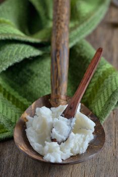 coconut oil on the wooden spoon