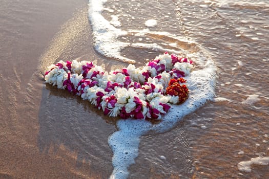 Garland on the beach at the ocean