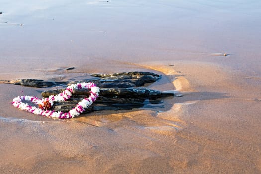 Garland on the beach at the ocean
