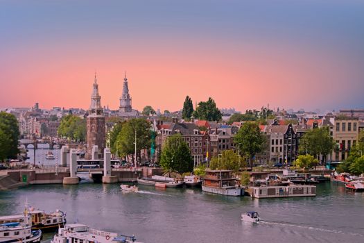 City scenic from Amsterdam in the Netherlands at sunset