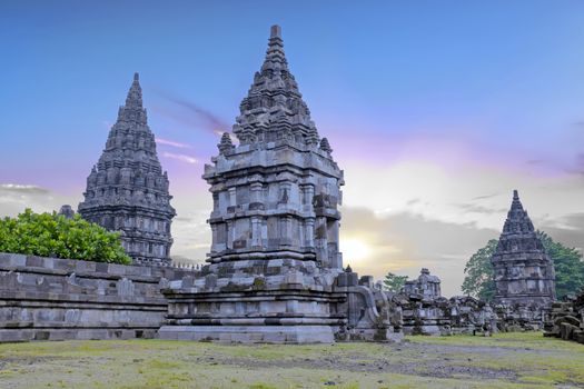 Prambanan or Candi Rara Jonggrang is a Hindu temple compound in Java, Indonesia, dedicated to the Trimurti: the Creator (Brahma), the Preserver (Vishnu) and the Destroyer (Shiva) at sunset