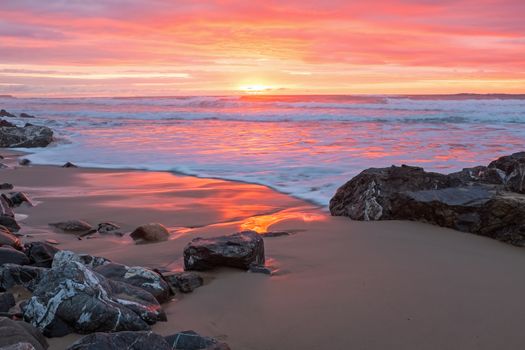 Incredible sunset at the atlantic ocean in Portugal