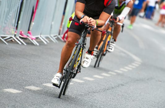 Unrecognizable professional cyclists during the bicycle competition.