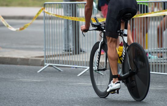 Unrecognizable professional cyclist during the bicycle competition.