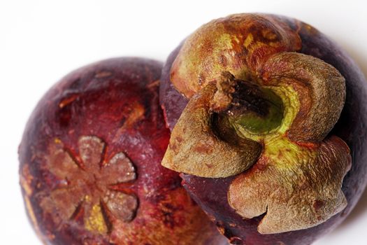 Mangostan - Exotic Fruit close up on white background