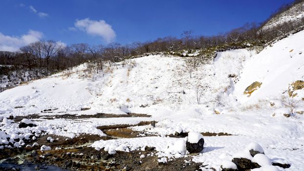 Noboribetsu onsen and bridge hell valley snow winter national park in Jigokudani, Hokkaido, Japan