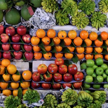 Colorful of fruit shop at Dalat marketplace, Vietnam, many kind of fresh tropical fruits arrange so amazing, agriculture product at farmer market