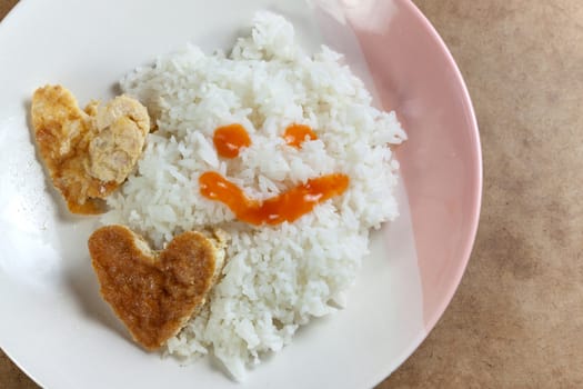 Idea for Valentine day meal cooked rice omelet in heart shape for eating simple cheap and quick food