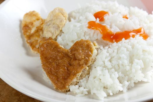 Idea for Valentine day meal cooked rice omelet in heart shape for eating simple cheap and quick food