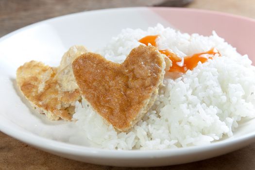 Idea for Valentine day meal cooked rice omelet in heart shape for eating simple cheap and quick food