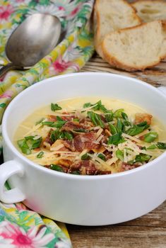 Creamy Loaded Baked Potato Soup with Bacon and Cheese,green onions