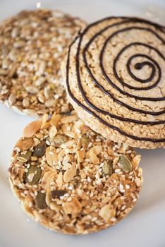 Mixed cookies on a white plate