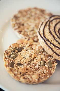 Mixed cookies on a white plate