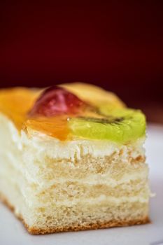 Piece of Fruit cake in a white plate