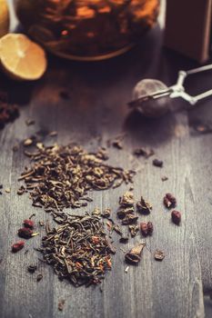 tea composition with cinnamon sticks, lemons