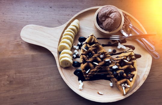 Belgian waffles with fruit and chocolate, forest fruit, all homemade, delicious batter