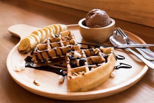 Belgian waffles with fruit and chocolate, forest fruit, all homemade, delicious batter