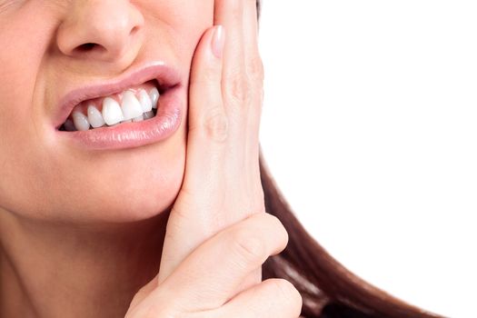 Woman with a toothpain, isolated on white background