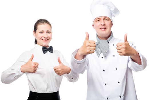 30-year-old waitress and chef shows a sign of success against a white background