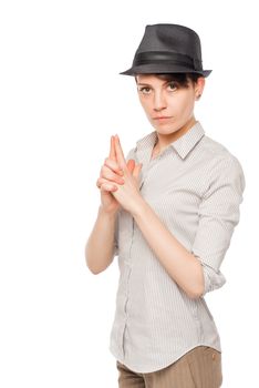 Detective woman thumbs gun on a white background isolated