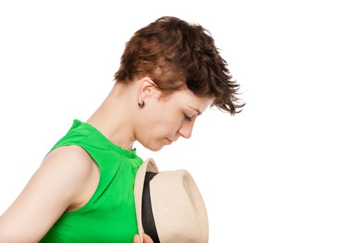 girl and her hat, portrait on a white background