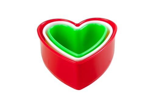 Idea for card Valentine day. Heart shaped cookie cutter on white background.Isolated on white with work paths.