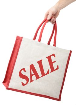 bag with sale printed on the side in red, isolated on a white background