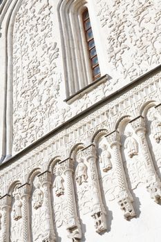 Wall fragment with stone curvings. Famous Assumption Cathedral in Russia, city of Vladimir