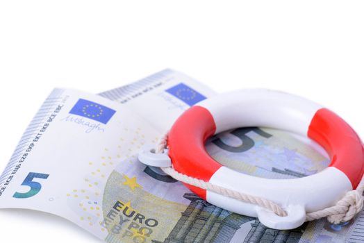 a life ring on euro notes, concept for saving the euro currency