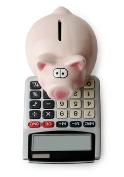 piggybank with calculator view from above isolated on a white background