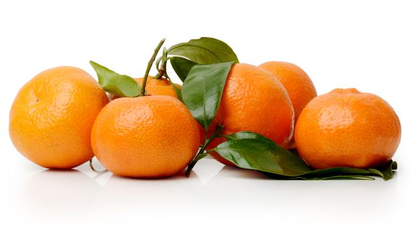 Ripe mandarin (satsuma or tangerine) isolated on a white background