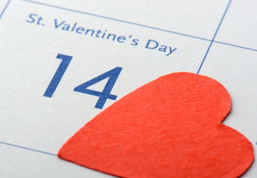 Calendar page with the red heart on February 14 of Saint Valentines day.