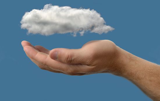 Cloud computing concept, close up of cloud over hand