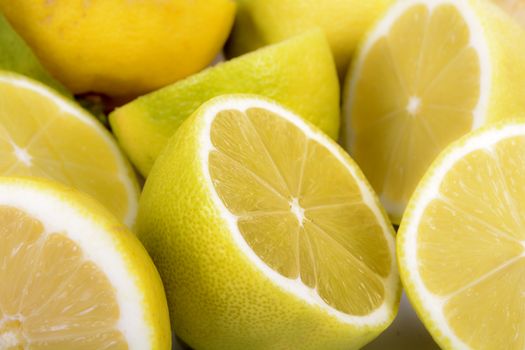 Cut lemons and isolated with white background