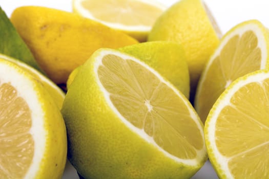 Cut lemons and isolated with white background