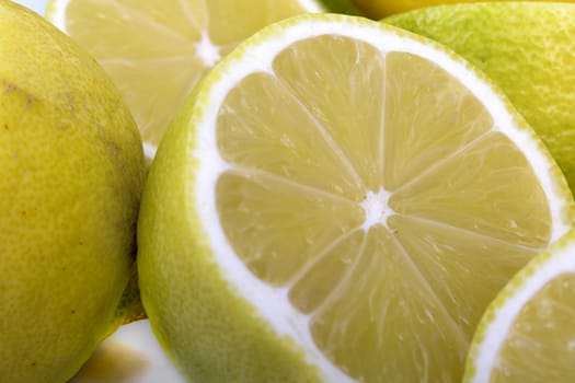 Cut lemons and isolated with white background