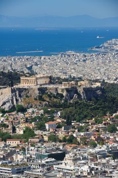 Athens Greece - April 27, 2016: Famous view from Lycabettus hill to modern city with Acropolis ans sea at background