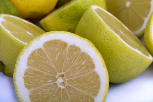 Cut lemons and isolated with white background