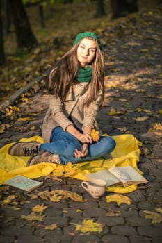 girl sitting on the track in the Park