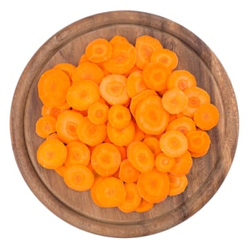 Sliced carrots on a cutting board. Isolated on white background. Top view.