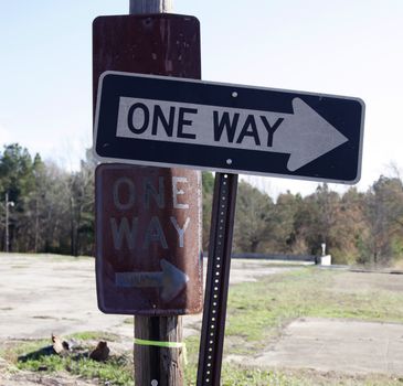 Close up of multiple one way signs in an area