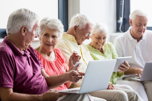 Seniors using technology in a retirement home